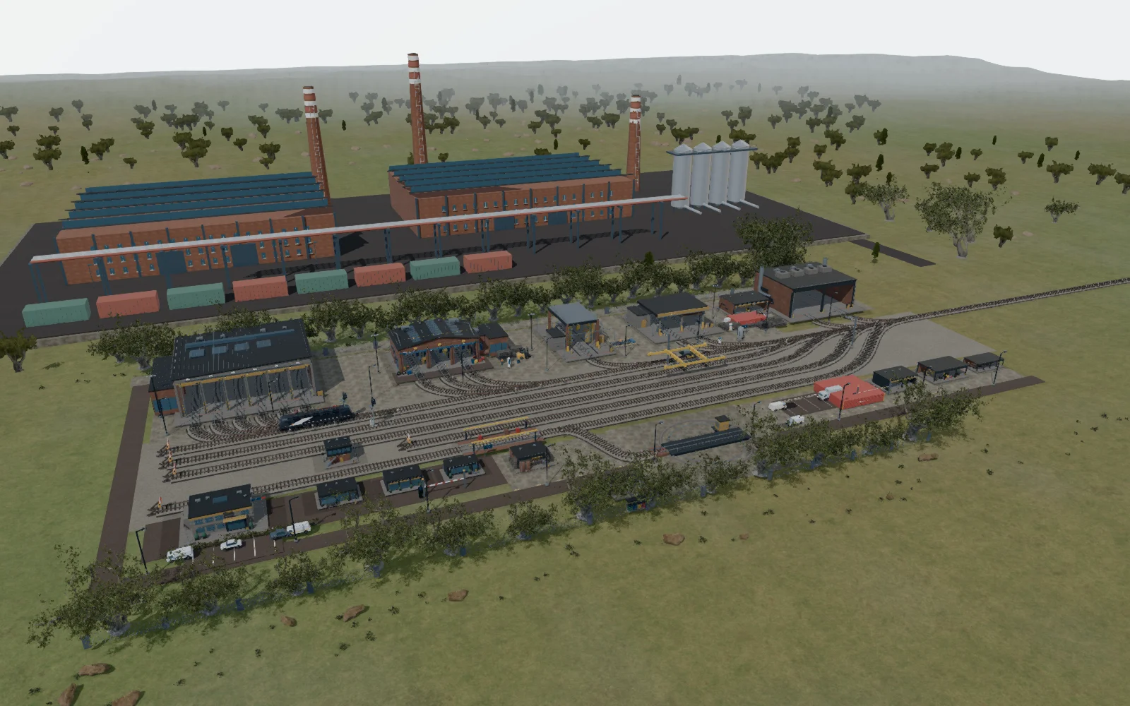 Le faisceau de voies de Stahlbruck devant son environnement industriel.